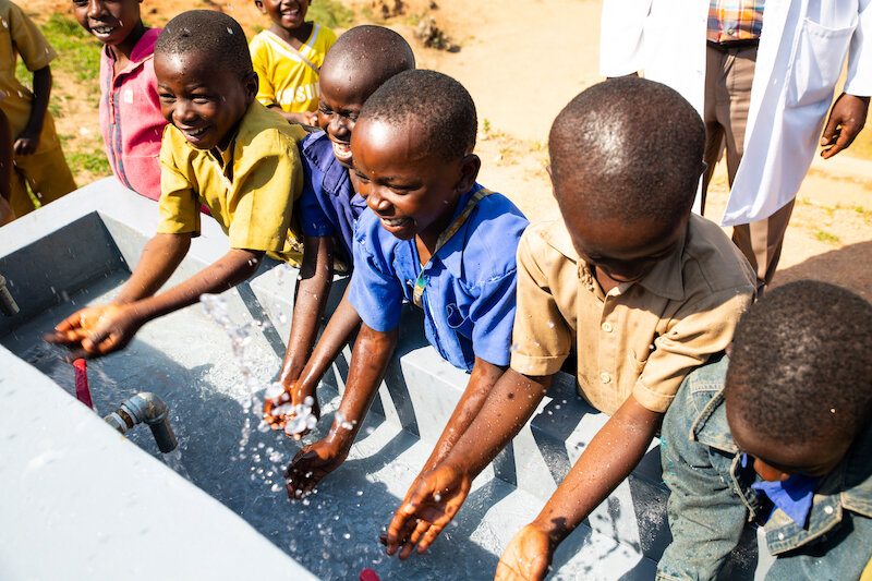 african children washing their hands