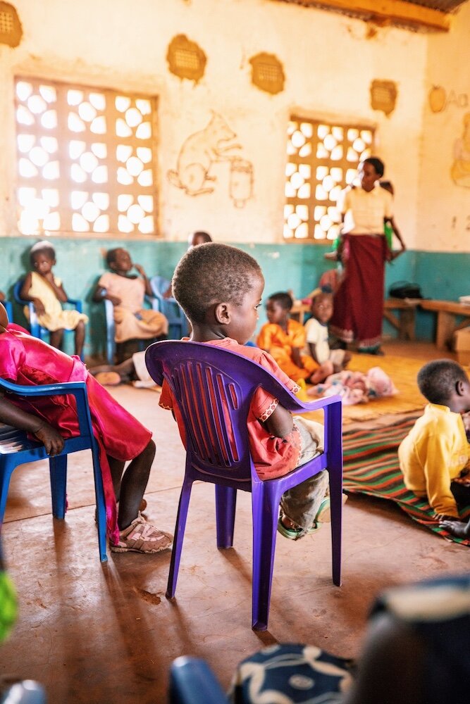 young student at a preschool that copred helped to found in malawi