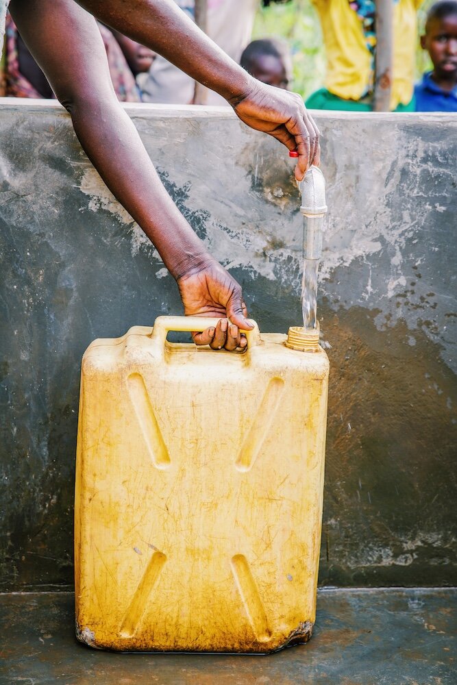 Jerrycan being filled with clean water