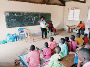girls and boys learning about menstrual health in classroom