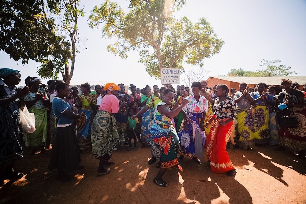 community members in malawi dancing