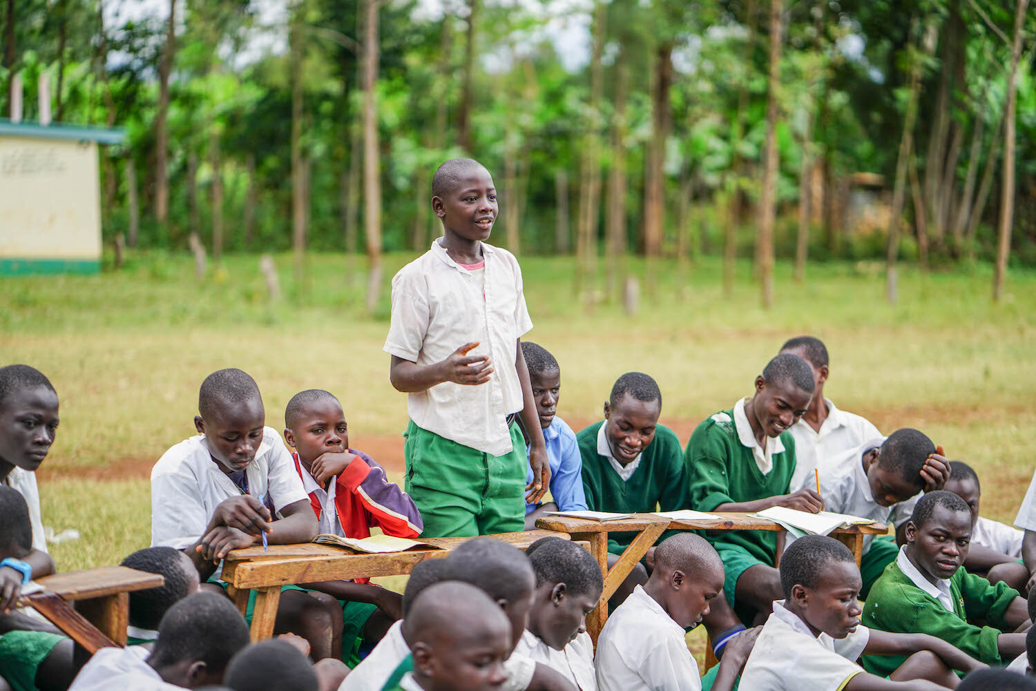 kenyan student speaking in front of other classmates